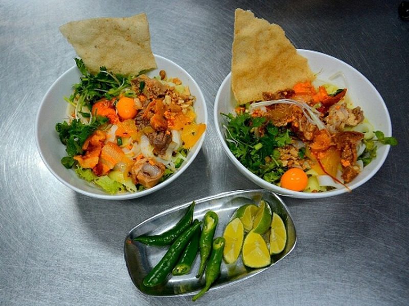 The Quang noodles have a distinct flavor. A bowl of this delicious dish contains noodles, broth, pork and fresh vegetables topped with scallion, cilantro and peanuts. The broth has the sweetness of finely crushed shrimp and the elements on this dish complement each other so well.